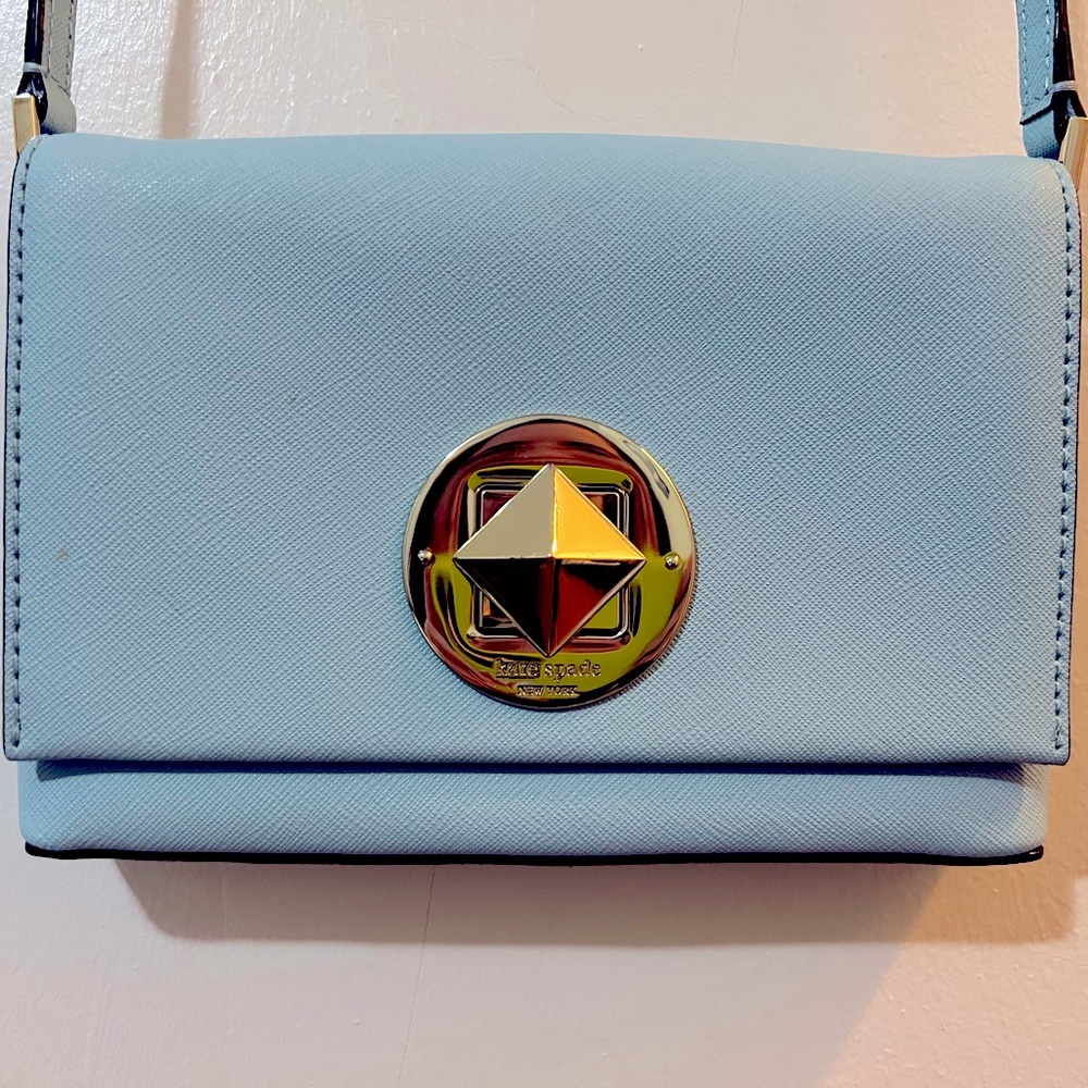 Kate Spade small crossbody purse in baby blue with diamond-shaped closure